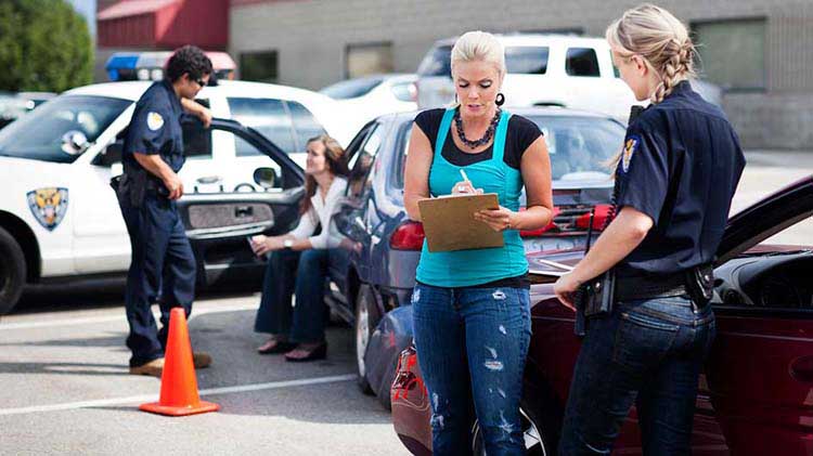 Woman filling out accident report