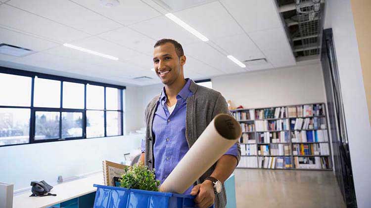 Man leaving a job with a box