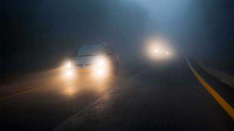 Dense fog on a highway.