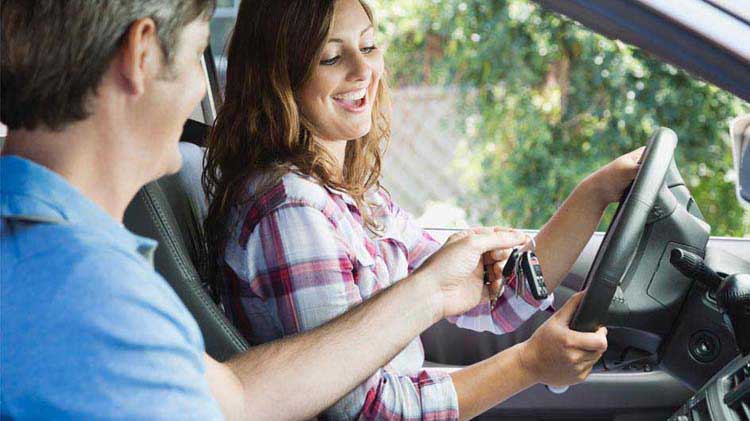 Teen driver learning about seat belt safety