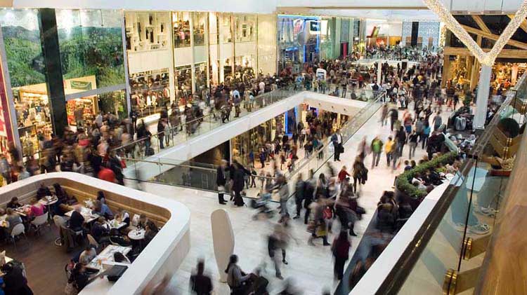 Holiday shopping crowds in a mall.