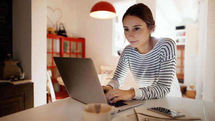 Budget minded girl on her laptop.