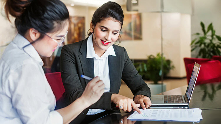 Woman discussing financial planning with a professional.