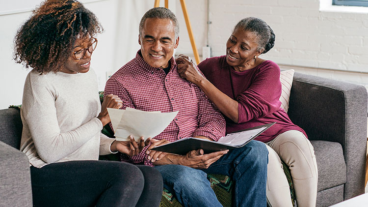 A couple talking to their financial professional.