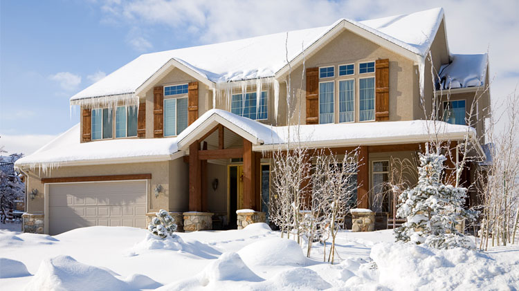 House surrounded by snow.