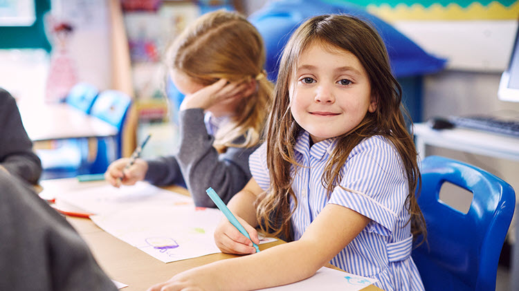 Girl in school benefiting from an education savings account.