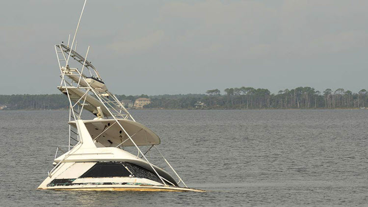 Boat sinking after a boat accident.