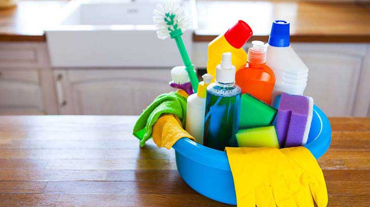 Bucket of spring cleaning items.