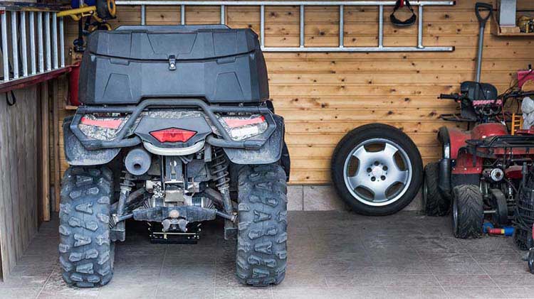 ATV stored in garage.