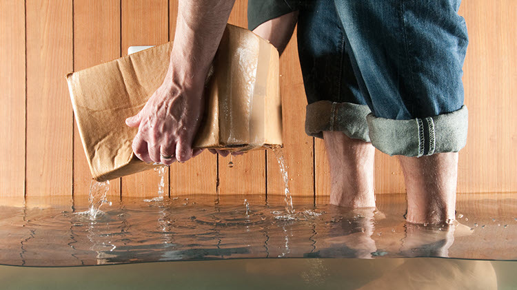 Water on the floor of a basement